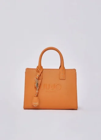 Borsa a mano piccola con ciondolo Borsa a mano piccola con ciondolo