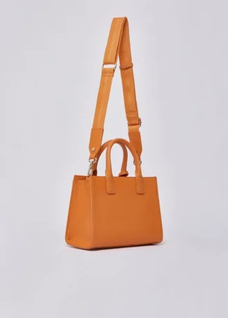 Borsa a mano piccola con ciondolo Borsa a mano piccola con ciondolo